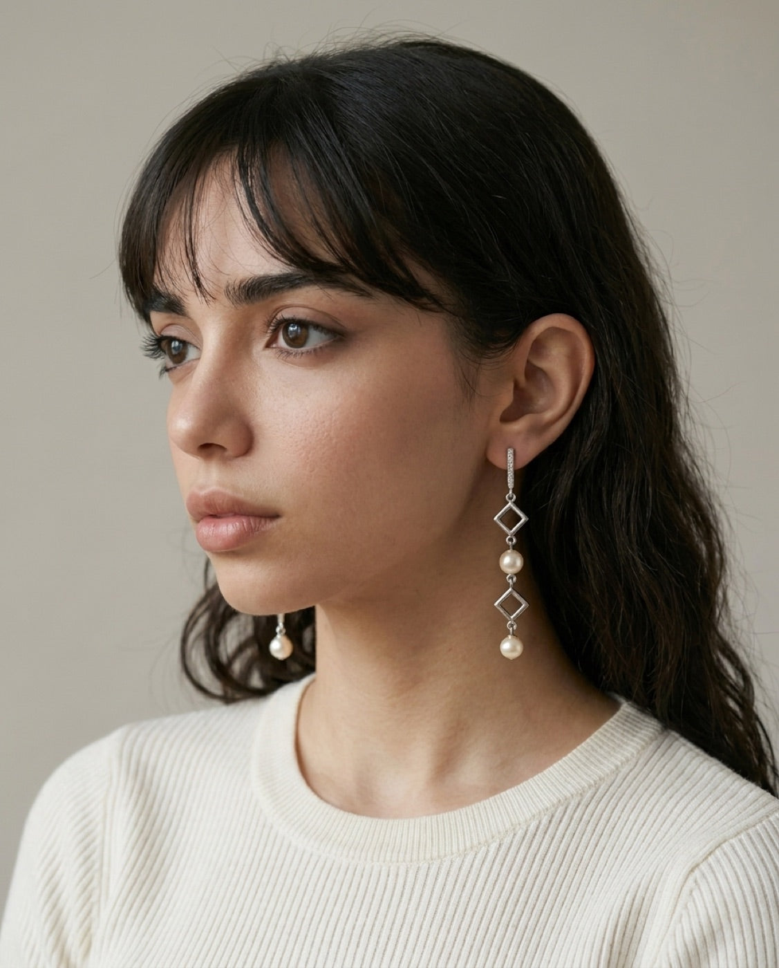 Rhombus Pearl Cascade Earrings worn